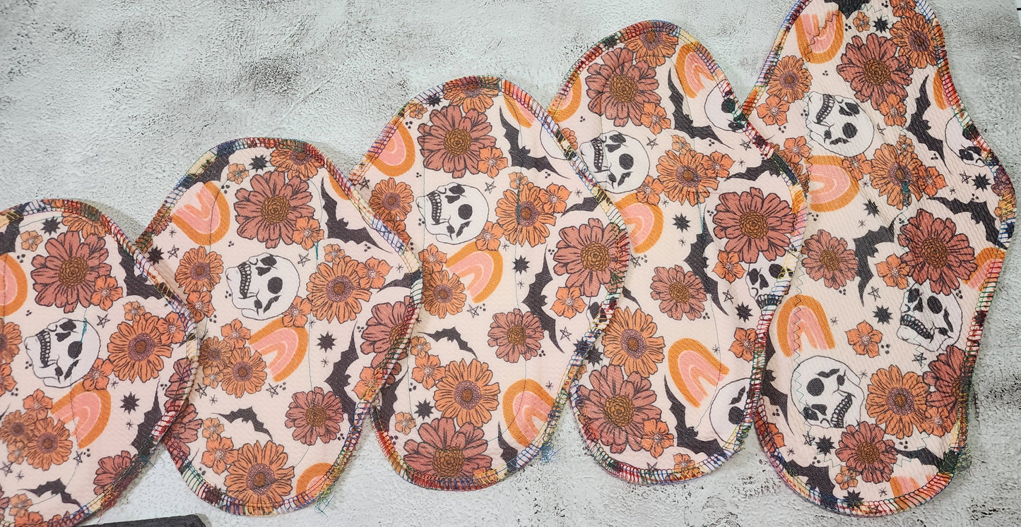 6/7/8/9/10/12/14 Set or SINGLE | Serged Style Cloth Pad | 2.5" or 2.75" snapped width | Floral Skull, Bat, rainbow