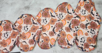 6/7/8/9/10/12/14 Set or SINGLE |  Serged Style Cloth Pad  |  2.5" or 2.75" snapped width | Floral Skull, Bat, rainbow